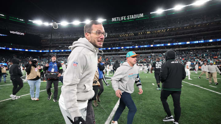 Nov 24, 2023; East Rutherford, New Jersey, USA; Miami Dolphins head coach Mike McDaniel runs off the