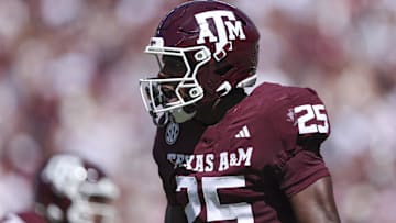 Sep 27, 2025; College Station, Texas, USA; Texas A&M Aggies safety Dalton Brooks (25) reacts after making a tackle during the first quarter against the Auburn Tigers at Kyle Field. Mandatory Credit: Troy Taormina-Imagn Images
