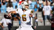 Nov 9, 2025; Charlotte, North Carolina, USA; New Orleans Saints quarterback Tyler Shough (6) throws a pass during the third quarter against the Carolina Panthers at Bank of America Stadium. Mandatory Credit: Bob Donnan-Imagn Images