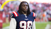 Dec 15, 2024; Glendale, Arizona, USA; New England Patriots defensive tackle Jeremiah Pharms Jr. (98) against the Arizona Cardinals at State Farm Stadium. Mandatory Credit: Mark J. Rebilas-Imagn Images