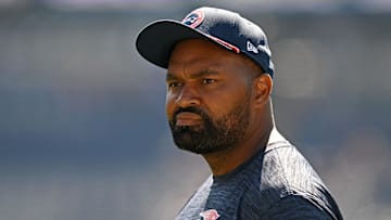 Sep 15, 2024; Foxborough, Massachusetts, USA; New England Patriots head coach Jerod Mayo watches warmups before a game against the Seattle Seahawks at Gillette Stadium.
