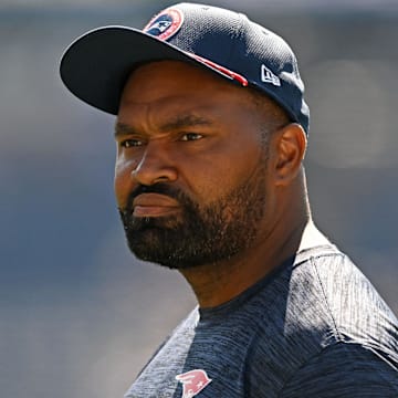 Sep 15, 2024; Foxborough, Massachusetts, USA; New England Patriots head coach Jerod Mayo watches warmups before a game against the Seattle Seahawks at Gillette Stadium.