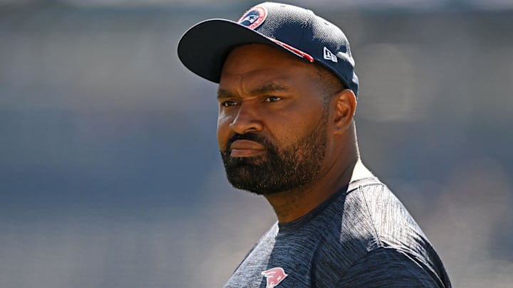 Sep 15, 2024; Foxborough, Massachusetts, USA; New England Patriots head coach Jerod Mayo watches warmups before a game against the Seattle Seahawks at Gillette Stadium.