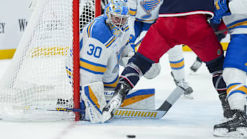 Nov 1, 2025; Columbus, Ohio, USA;  St. Louis Blues goaltender Joel Hofer (30) defends the net against the Columbus Blue Jackets in the second period at Nationwide Arena. Mandatory Credit: Aaron Doster-Imagn Images