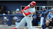 Feb 25, 2025; Port Charlotte, Florida, USA;  Philadelphia Phillies outfielder Justin Crawford (80) breaks his bat as he reaches on a fielders choice against the Tampa Bay Rays during the fourth inning at Charlotte Sports Park. Mandatory Credit: Kim Klement Neitzel-Imagn Images