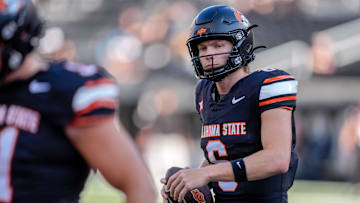 Oklahoma State quarterback Zane Flores (6) warms up before an NCAA football game between Oklahoma State (OSU) and Tulsa at Boone Pickens Stadium in Stillwater, Okla., on Friday, Sept. 19, 2025.
