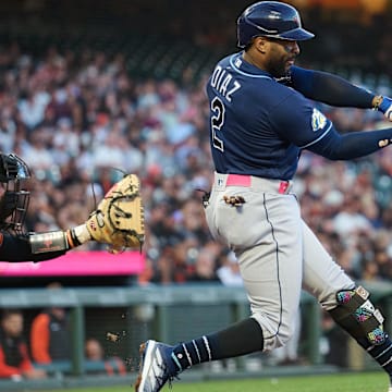 Aug 14, 2023; San Francisco, California, USA; Tampa Bay Rays infielder Yandy Diaz (2) hits an RBI double against the San Francisco Giants during the fourth inning at Oracle Park.