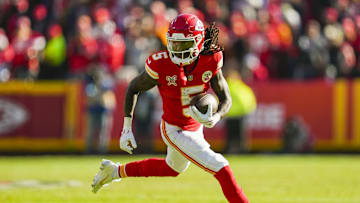 Dec 21, 2024; Kansas City, Missouri, USA; Kansas City Chiefs wide receiver Hollywood Brown (5) runs with the ball during the first half against the Houston Texans at GEHA Field at Arrowhead Stadium. Mandatory Credit: Jay Biggerstaff-Imagn Images