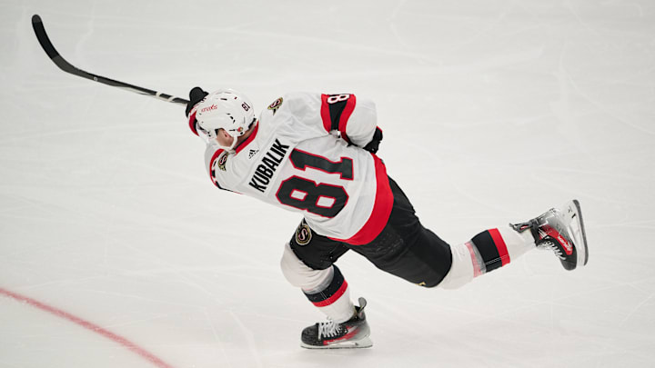 Mar 9, 2024; San Jose, California, USA; Ottawa Senators left wing Dominik Kubalik (81) shoots the puck against the San Jose Sharks during the third period at SAP Center at San Jose. Mandatory Credit: Robert Edwards-Imagn Images