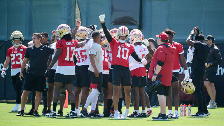 Jul 27, 2023; Santa Clara, CA, USA; San Francisco 49ers wide receiver Ronnie Bell (10) and members of the offensive squad huddle between drills during training camp at the SAP Performance Facility. Mandatory Credit: Robert Edwards-USA TODAY Sports