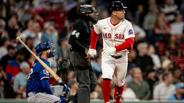 Alex Bregman heading to first base against the Texas Rangers