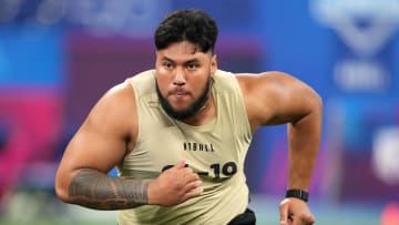 Mar 3, 2024; Indianapolis, IN, USA; Washington offensive lineman Troy Fautanu (OL19) during the 2024 NFL Combine at Lucas Oil Stadium. Mandatory Credit: Kirby Lee-USA TODAY Sports