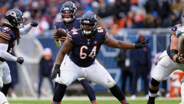 Dec 10, 2023; Chicago, Illinois, USA;  Chicago Bears offensive lineman Nate Davis (64) blocks against the Detroit Lions at Soldier Field. Mandatory Credit: Jamie Sabau-USA TODAY Sports