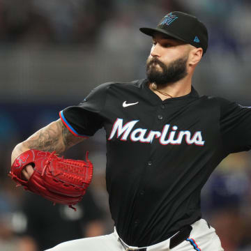 Jun 7, 2024; Miami, Florida, USA;  Miami Marlins pitcher Tanner Scott (66) pitches in the ninth inning against the Cleveland Guardians at loanDepot Park.