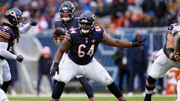 Dec 10, 2023; Chicago, Illinois, USA;  Chicago Bears offensive lineman Nate Davis (64) blocks against the Detroit Lions at Soldier Field.