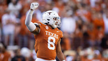 Dec 21, 2024; Austin, Texas, USA; Texas Longhorns edge Trey Moore (8) against the Clemson Tigers during the CFP National playoff first round at Darrell K Royal-Texas Memorial Stadium.