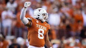 Dec 21, 2024; Austin, Texas, USA; Texas Longhorns edge Trey Moore (8) against the Clemson Tigers during the CFP National playoff first round at Darrell K Royal-Texas Memorial Stadium.