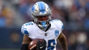 Dec 10, 2023; Chicago, Illinois, USA; Detroit Lions running back Jahmyr Gibbs (26) rushes the ball for a touchdown against the Chicago Bears during the first half at Soldier Field. Mandatory Credit: Mike Dinovo-USA TODAY Sports