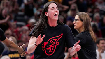 Indiana Fever guard Caitlin Clark (22) yells in excitement Wednesday, July 30, 2025, during the game at Gainbridge Fieldhouse in Indianapolis. The Indiana Fever defeated the Phoenix Mercury, 107-101.