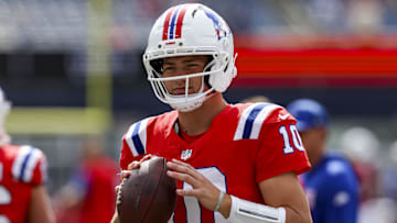 Sep 21, 2025; Foxborough, Massachusetts, USA; New England Patriots quarterback Drake Maye (10) warms up before the game aginst the Pittsburgh Steelers at Gillette Stadium. Mandatory Credit: Paul Rutherford-Imagn Images