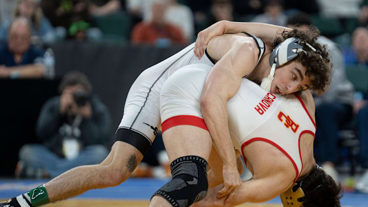 Saint John Vianney’s Anthony Knox, top, wrestles Bergen Catholic’s Nathan Braun in the championship XX match during finals of the NJSIAA individual wrestling state championships at Boardwalk Hall in Atlantic City on Friday, March 8, 2025. Saint John Vianney’s Anthony Knox is awarded the 126lb state championship title and is a 4-time state champion.