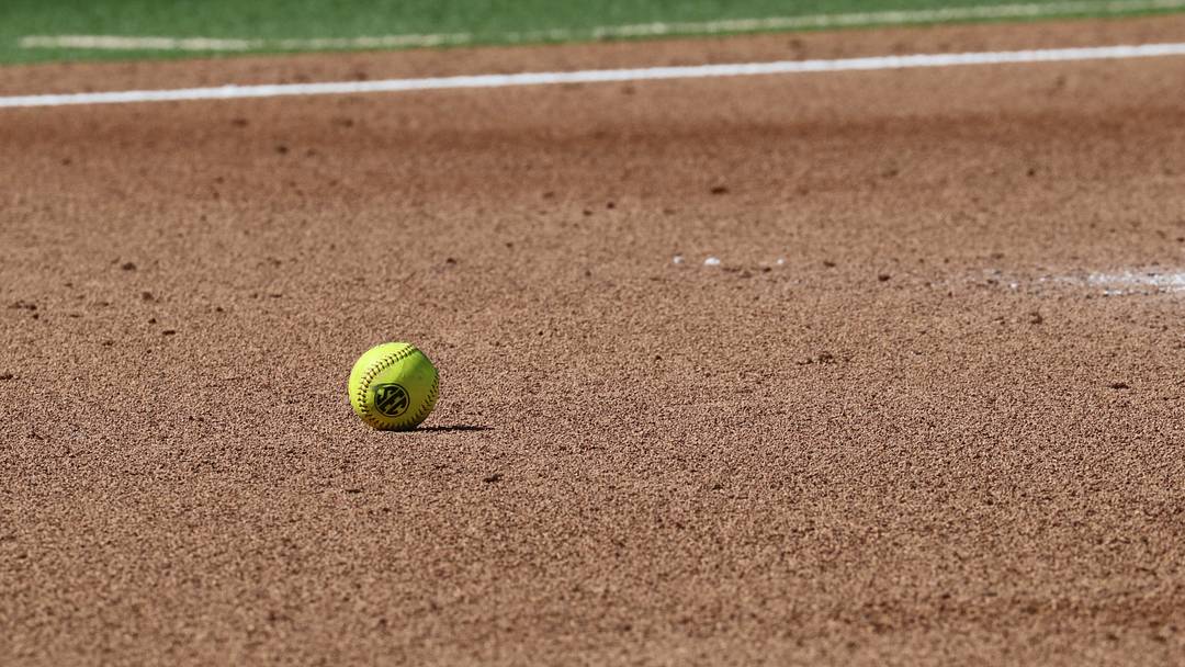 A softball lands near the circle at Love's Field. A softball lands near the circle at Love's Field.