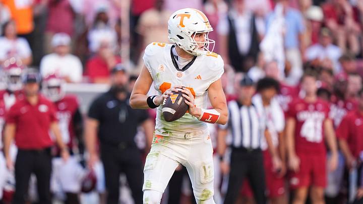 Tennessee quarterback George MacIntyre (12) looks for an open receiver during a college football game against Arkansas at Donald W. Reynolds Razorback Stadium in Fayetteville, Ark., on Oct. 10, 2026.