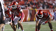 Utah Utes offensive linemen Spencer Fano (55) and Michael Mokofisi (52) were part of a unit that paved the way for the nation's No. 2 rushing attack based on yards per game.