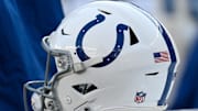 Dec 1, 2024; Foxborough, Massachusetts, USA; An Indianapolis Colts helmet sits on an equipment case during the first half against the New England Patriots at Gillette Stadium. Mandatory Credit: Eric Canha-Imagn Images