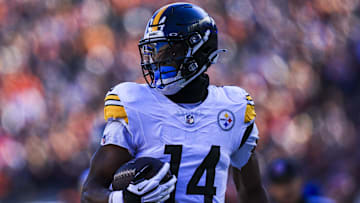 Dec 1, 2024; Cincinnati, Ohio, USA; Pittsburgh Steelers wide receiver George Pickens (14) runs the ball in for a touchdown against the Cincinnati Bengals in the first half at Paycor Stadium. Mandatory Credit: Katie Stratman-Imagn Images