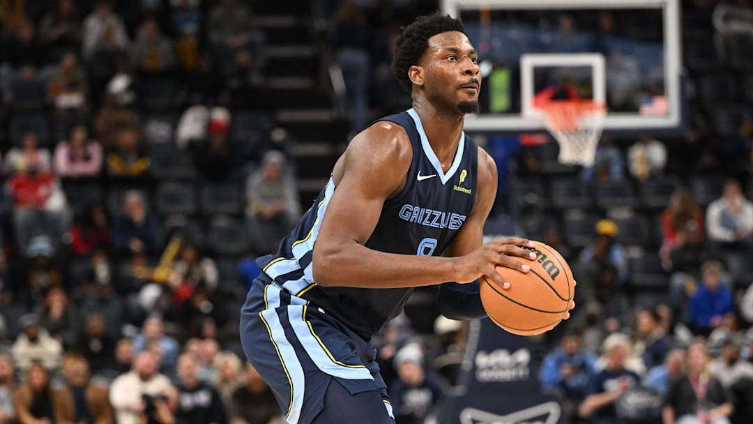 Jan 28, 2026; Memphis, Tennessee, USA; Memphis Grizzlies power forward Jaren Jackson Jr. (8) shoots a three-point shot in the second quarter against the Charlotte Hornets at FedExForum. Mandatory Credit: Matthew Smith-Imagn Images