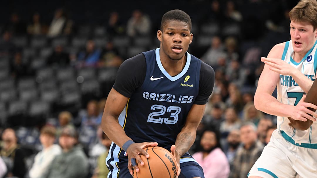 Jan 28, 2026; Memphis, Tennessee, USA; Memphis Grizzlies forward Cedric Coward (23) drives to the basket in the first quarter against the Charlotte Hornets at FedExForum. Mandatory Credit: Matthew Smith-Imagn Images