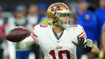 Oct 2, 2025; Inglewood, California, USA; San Francisco 49ers quarterback Mac Jones (10) drops back to pass against the Los Angeles Rams during the first half at SoFi Stadium. 