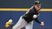 Jul 11, 2024; Milwaukee, Wisconsin, USA; Pittsburgh Pirates starting pitcher Paul Skenes (30) pitches in the first inning against the Milwaukee Brewers at American Family Field. Mandatory Credit: Benny Sieu-USA TODAY Sports