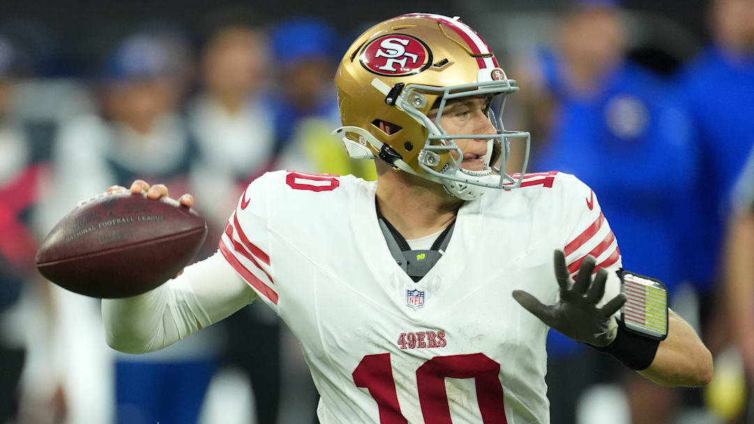 Oct 2, 2025; Inglewood, California, USA; San Francisco 49ers quarterback Mac Jones (10) drops back to pass against the Los Angeles Rams during the first half at SoFi Stadium. Mandatory Credit: Kirby Lee-Imagn Images