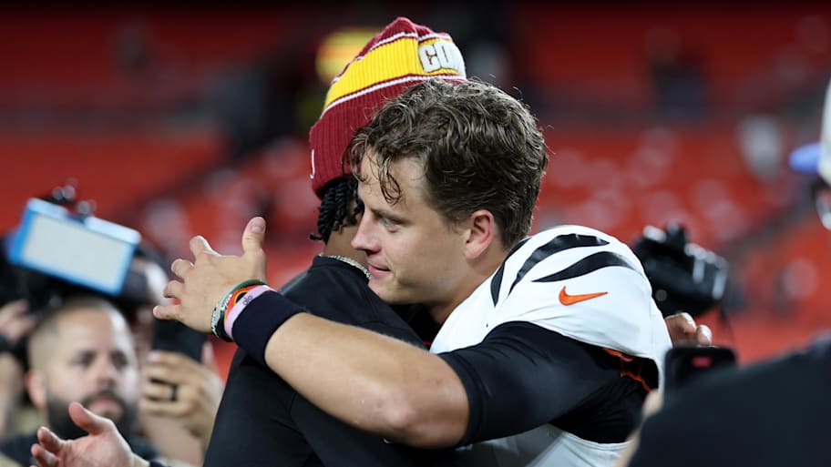Joe Burrow and Jayden Daniels, two former LSU QBs, shared a quick hug after Monday night's Bengals-Commanders game.  | Amber Searls-Imagn Images