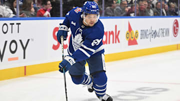 Nov 8, 2023; Toronto, Ontario, CAN; Toronto Maple Leafs forward Nick Robertson (89) skates with the puck against the Ottawa Senators in the third period at Scotiabank Arena. Mandatory Credit: Dan Hamilton-Imagn Images