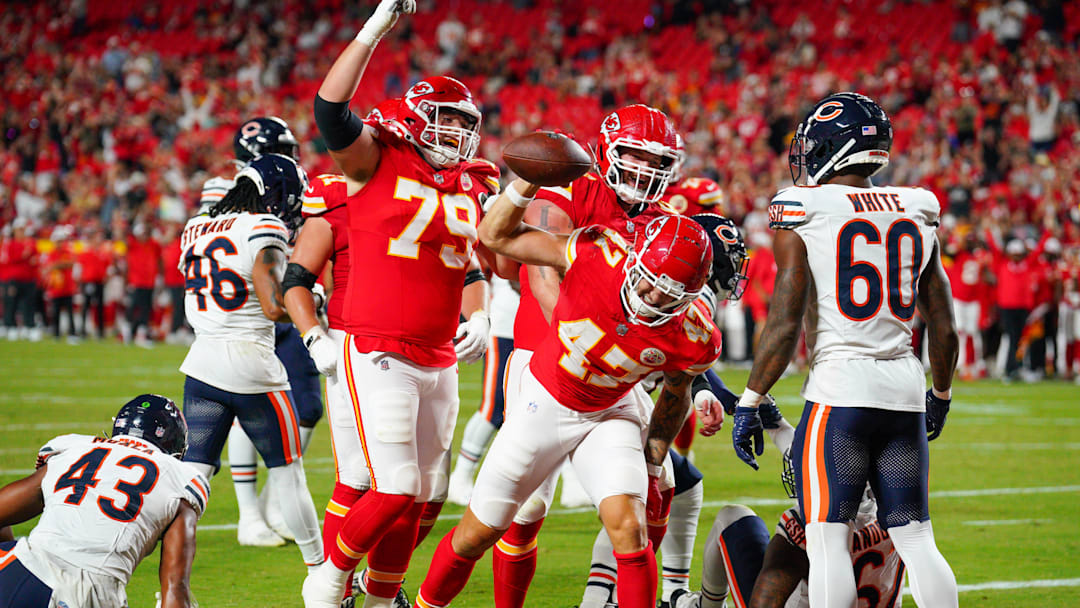 Kansas City Chiefs tight end Baylor Cupp (47) spikes the ball after scoring against the Chicago Bears Mandatory Credit: Denny Medley-Imagn Images