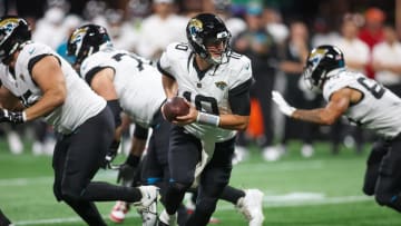 Aug 23, 2024; Atlanta, Georgia, USA; Jacksonville Jaguars quarterback Mac Jones (10) hands the ball off against the Atlanta Falcons in the second quarter at Mercedes-Benz Stadium. Mandatory Credit: Brett Davis-USA TODAY Sports