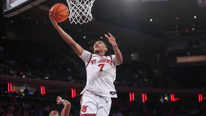 Jan 22, 2025; New York, New York, USA;  St. John's basketball guard Simeon Wilcher (7) goes in for a layup in the second half against the Xavier Musketeers at Madison Square Garden.