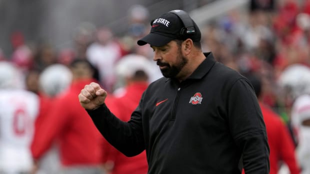 Oct. 14, 2023; Lafayette, In., USA; 
Ohio State Buckeyes head coach Ryan Day pumps his fast after a touchdown by Ohio State Buckeyes quarterback Devin Brown (33) during the first half of Saturday's NCAA Division I football game against the Purdue Boilermakers at Ross-Ade Stadium in Lafayette.