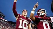 Oklahoma's John Mateer (10) and Jaydn Ott (0) sing the alma mater following the college football game between the University of Oklahoma Sooners and the Illinois State Redbirds at the Gaylord Family Oklahoma Memorial Stadium in Norman, Okla., Saturday, Aug. 30, 2025.