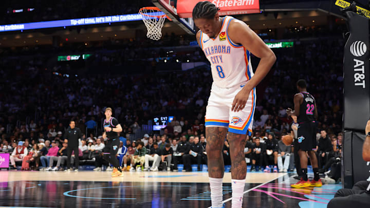 Jan 17, 2026; Miami, Florida, USA; Oklahoma City Thunder guard Jalen Williams (8) grabs the back of his right leg after a play against the Miami Heat during the second quarter at Kaseya Center. Mandatory Credit: Sam Navarro-Imagn Images