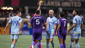 May 28, 2025; Atlanta, Georgia, USA; Players argue after Orlando City midfielder Cesar Araujo (5) grabbed the throat of Atlanta United midfielder Mateusz Klich (43), causing a red card to be issued against him during the second half at Mercedes-Benz Stadium. Mandatory Credit: Dale Zanine-Imagn Images