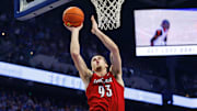 Dec 14, 2024; Lexington, Kentucky, USA; Louisville Cardinals forward Noah Waterman (93) goes to the basket during the first half against the Kentucky Wildcats at Rupp Arena at Central Bank Center.