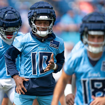 Tennessee Titans wide receiver DeAndre Hopkins (10) goes through warmups at Nissan Stadium in Nashville, Tenn., Saturday, July 27, 2024. The Titans hosted Back Together Weekend to allow fans to get a look at the retooled team.