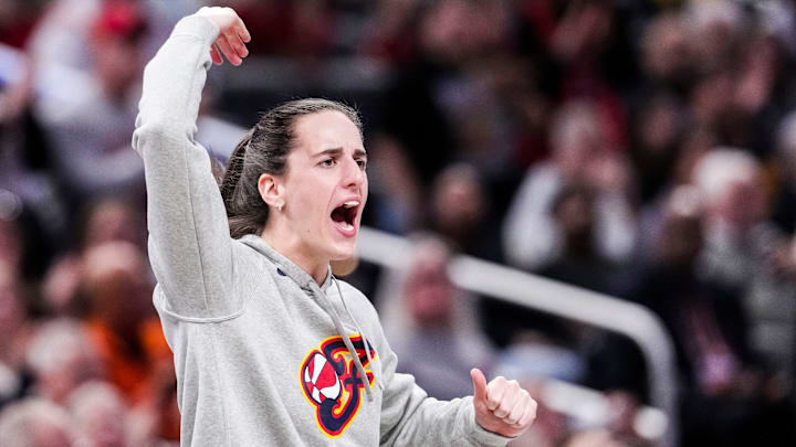 Indiana Fever guard Caitlin Clark (22) gets the crowd excited Saturday, May 3, 2025, during a preseason game between the Indiana Fever and the Washington Mystics. Indiana Fever guard Caitlin Clark (22) gets the crowd excited Saturday, May 3, 2025, during a preseason game between the Indiana Fever and the Washington Mystics.