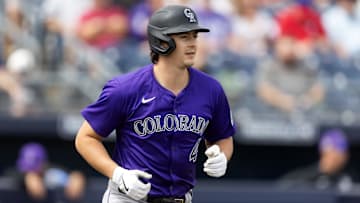 Mar 5, 2025; Peoria, Arizona, USA; Colorado Rockies infielder Michael Toglia against the San Diego Padres during a spring training game at Peoria Sports Complex. Mandatory Credit: Mark J. Rebilas-Imagn Images