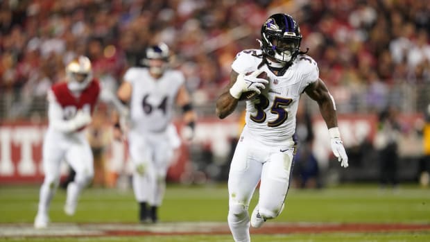 Baltimore Ravens running back Gus Edwards runs against the San Francisco 49ers