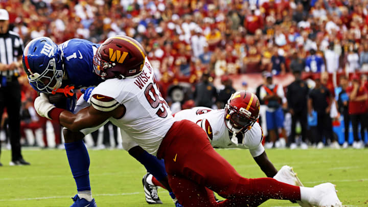 Washington Commanders defensive end Deatrich Wise Jr. tackles New York Giants wide receiver Malik Nabers. Washington Commanders defensive end Deatrich Wise Jr. tackles New York Giants wide receiver Malik Nabers.